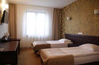 Отель Hotel Szyszko Сувалки Двухместный номер с 1 кроватью или 2 отдельными кроватями-14